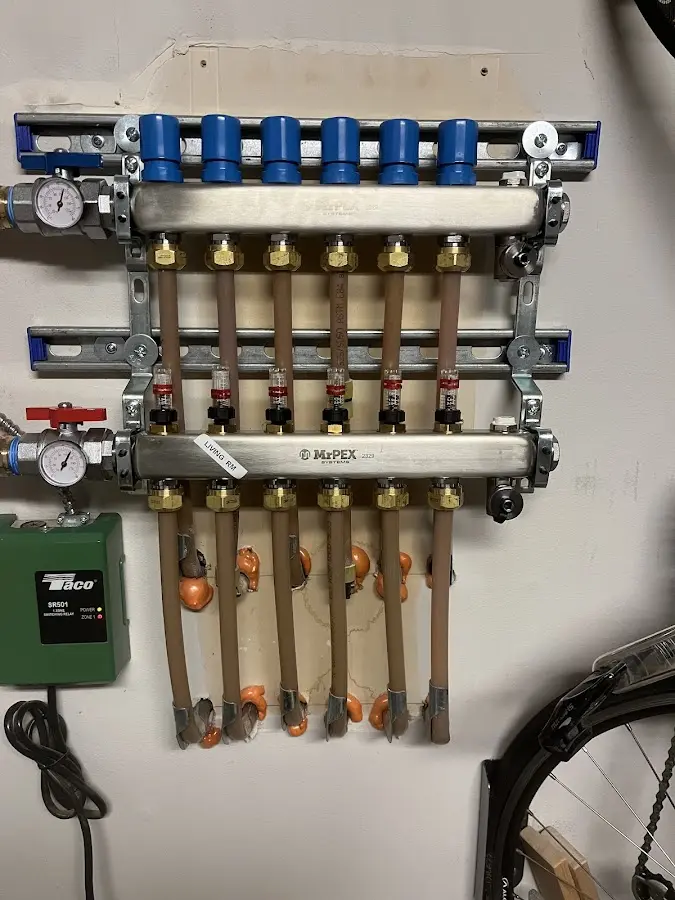 Plumber performing Water Heater Repair at a residential property in Absecon